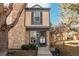 Charming home featuring a stone accent wall and a well-maintained front yard at 2927 W 81St Ave # H, Westminster, CO 80031