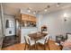 Inviting space with wood floors, leading into the dining area and well-equipped kitchen at 2927 W 81St Ave # H, Westminster, CO 80031