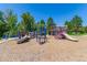 Community playground with colorful slides and climbing structures, perfect for Gathering fun at 2927 W 81St Ave # H, Westminster, CO 80031