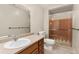 Clean bathroom with shower and updated vanity at 12070 E Arizona Ave, Aurora, CO 80012