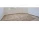 Bedroom with neutral carpet, white walls, and a door with natural light coming through a window at 14578 W 90Th Ln # B, Arvada, CO 80005