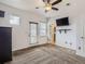 Bright bedroom with plush carpet, neutral walls, and a door to the balcony at 11250 Florence St # 20B, Commerce City, CO 80640