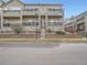 Beautiful townhouse with stone accents, private balconies, and well-maintained landscaping at 11250 Florence St # 20B, Commerce City, CO 80640