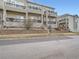Charming townhouse with private balconies, stone accents, and easy access to community amenities at 11250 Florence St # 20B, Commerce City, CO 80640