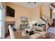 Inviting living room featuring a fireplace, ample seating, and a bright, open layout at 11250 Florence St # 20B, Commerce City, CO 80640