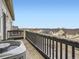 Open patio showcasing neighborhood views, offering an outdoor retreat, and nice wooden deck at 11250 Florence St # 20B, Commerce City, CO 80640