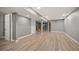 Large basement space features wood flooring and recessed lighting at 7582 Powderhorn Dr, Lone Tree, CO 80124