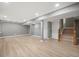 Open basement area with recessed lighting and stairs at 7582 Powderhorn Dr, Lone Tree, CO 80124