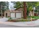 A beige brick facade and an arched walkway to the front door lend this home a touch of elegance at 8793 E Monmouth Pl, Denver, CO 80237
