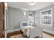 Bedroom showcasing hardwood floors, white trim, and bright natural light at 815 Gaylord St, Denver, CO 80206