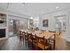 Spacious dining room features a large table, skylights, and easy access to the kitchen and outdoor area at 815 Gaylord St, Denver, CO 80206