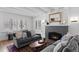 Inviting living room featuring a fireplace and hardwood floors at 815 Gaylord St, Denver, CO 80206