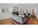 Cozy living room featuring a fireplace, hardwood floors, and comfortable sofas at 815 Gaylord St, Denver, CO 80206