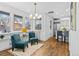 Inviting living room featuring large windows, hardwood floors, and comfortable seating at 815 Gaylord St, Denver, CO 80206