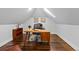 Office featuring hardwood floors, built-in bookshelf and natural light at 815 Gaylord St, Denver, CO 80206