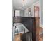 Stylish staircase with dark wood railings and views of the home's interior at 815 Gaylord St, Denver, CO 80206