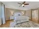Serene bedroom with a king-size bed, and hardwood floors at 5 Catamount Ln, Littleton, CO 80127