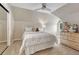 Cozy bedroom features carpet, a comfy bed, and natural light at 5 Catamount Ln, Littleton, CO 80127