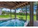 Inviting hot tub on a wooden deck offers a tranquil outdoor experience and scenic views at 5 Catamount Ln, Littleton, CO 80127