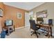 Functional home office with desk, chair, and storage at 5 Catamount Ln, Littleton, CO 80127