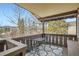 Relaxing balcony with mountain views, outdoor furniture, and a cozy area rug at 1941 Boreas Pass Rd # 1C, Breckenridge, CO 80424