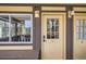 Exterior view of condo entryway with window and door at 1941 Boreas Pass Rd # 1C, Breckenridge, CO 80424
