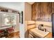 Kitchen nook with a breakfast table, and rustic wood cabinetry at 1941 Boreas Pass Rd # 1C, Breckenridge, CO 80424