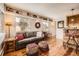 Cozy living room featuring hardwood floors, comfortable seating, and plenty of natural light at 1941 Boreas Pass Rd # 1C, Breckenridge, CO 80424