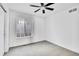 Bedroom with large windows and neutral walls at 2667 Xanthia Ct, Denver, CO 80238