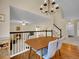 View of dining area, stairs, and fireplace at 1234 Riddlewood Ln, Highlands Ranch, CO 80129