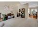 Spacious living room with bright lighting and an easy flow into the dining room at 1234 Riddlewood Ln, Highlands Ranch, CO 80129