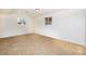 Bright basement with carpet, natural light, and neutral tones, ideal for relaxation or entertainment at 846 E 114Th Pl, Northglenn, CO 80233