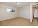 Comfortable bedroom featuring carpet, natural light, closet and neutral colors at 846 E 114Th Pl, Northglenn, CO 80233