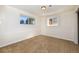 Cozy bedroom with neutral carpet, natural light from two windows, and a minimalist aesthetic at 846 E 114Th Pl, Northglenn, CO 80233
