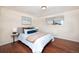 Calm bedroom with hardwood floors, soft bedding, and natural light at 846 E 114Th Pl, Northglenn, CO 80233