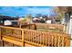 Multi-tiered wood deck perfect for outdoor gatherings, overlooking manicured lawns and blue sky at 846 E 114Th Pl, Northglenn, CO 80233