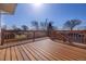 Spacious wooden deck overlooking a fenced yard, perfect for enjoying the outdoors at 846 E 114Th Pl, Northglenn, CO 80233