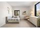 Bright bedroom featuring neutral walls, a comfortable daybed, and stylish decor at 9 Polo Field Ln, Denver, CO 80209