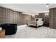 Spacious bedroom with decorative wallpaper and ample natural light at 9 Polo Field Ln, Denver, CO 80209