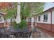 Relaxing patio area with outdoor seating and landscaping for perfect outdoor living at 4072 Ames St, Wheat Ridge, CO 80212
