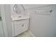 Modern bathroom with white vanity, updated fixtures, and tile flooring at 436 Cherokee St, Denver, CO 80204
