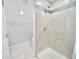 Updated bathroom with a walk-in shower and tile surround at 436 Cherokee St, Denver, CO 80204
