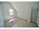 Bright bedroom with carpet and large window at 436 Cherokee St, Denver, CO 80204