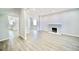 Bright living room featuring hardwood floors and a fireplace at 436 Cherokee St, Denver, CO 80204