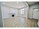 Bright living room with hardwood floors and fireplace at 436 Cherokee St, Denver, CO 80204