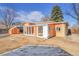 The home's exterior has a large, fenced backyard and a closed-in patio with large windows at 3164 Scranton St, Aurora, CO 80011