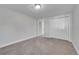This spacious bedroom is complete with an entry door and a large closet with sliding doors at 3164 Scranton St, Aurora, CO 80011