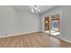 Bright dining room with sliding glass door that leads outside at 3164 Scranton St, Aurora, CO 80011