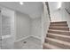 Bright laundry room offers convenience with washer/dryer hookups and leads to a modern-tiled shower at 3164 Scranton St, Aurora, CO 80011
