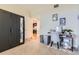 Bedroom featuring a wardrobe and an exit door, with a study table and an office chair at 7220 W Bonfils Ln # 206, Lakewood, CO 80226